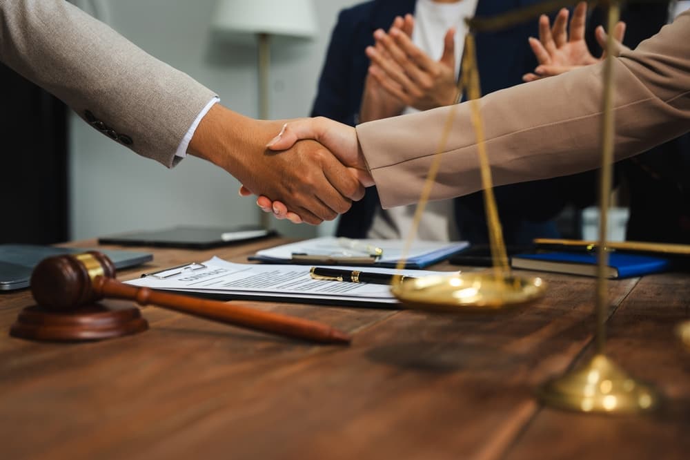 Lawyer or judge consult having team meeting at law office