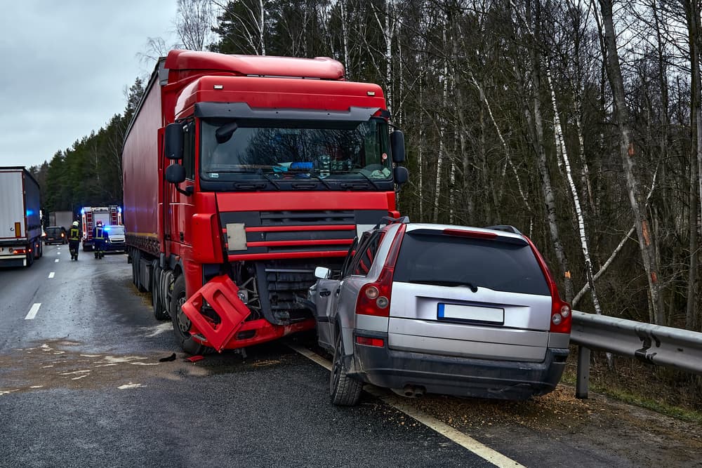  Car after a collision with a heavy truck