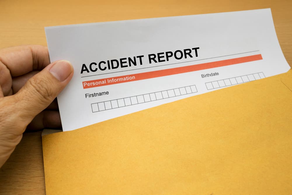 Accident report form in brown envelope